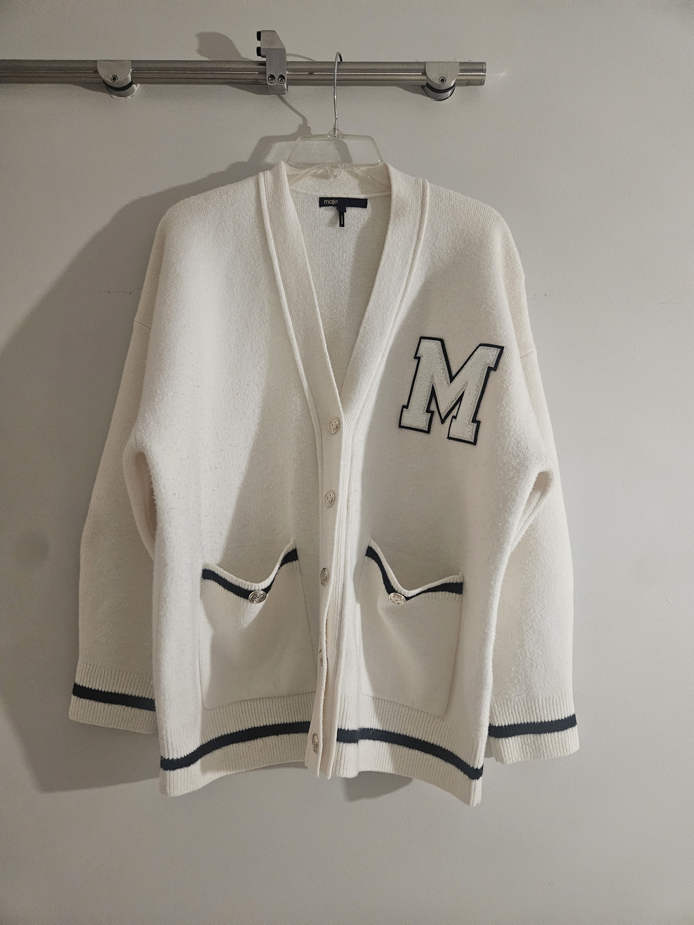 Cream Button-Up Cardigan with Black Trim and 'M' Embroidery - Picture 2 of 3